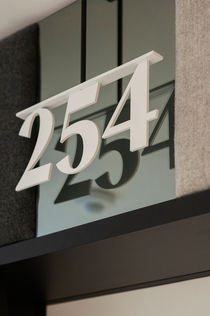 Room number 254 sign